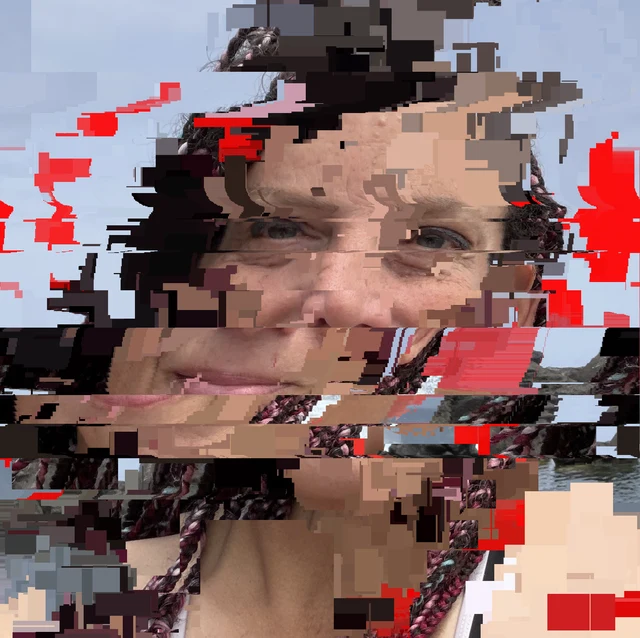 Caitlyn Meeks, datamoshed: a portrait in a wide-brimmed hat by the sea, sliced into horizontal bands of displaced pixels and blocks of red